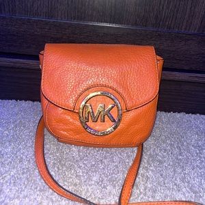 Authentic orange Michael Kors crossbody bag